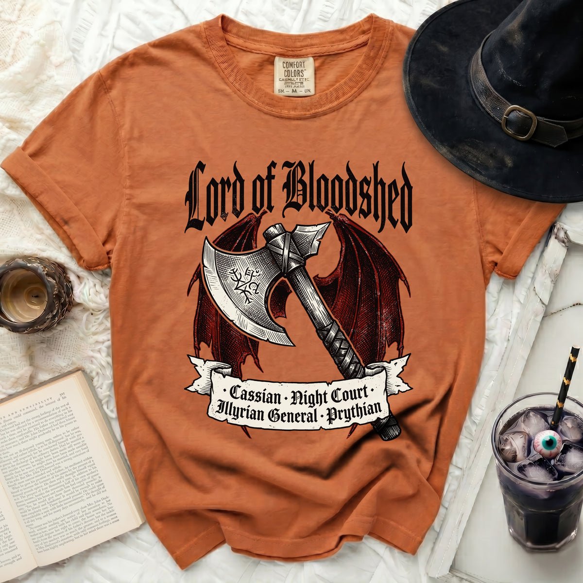Orange t-shirt with "Lord of Bloodshed" and axe graphic.