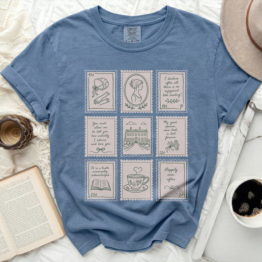 Blue t-shirt with nine postage stamp illustrations and snippets of text.