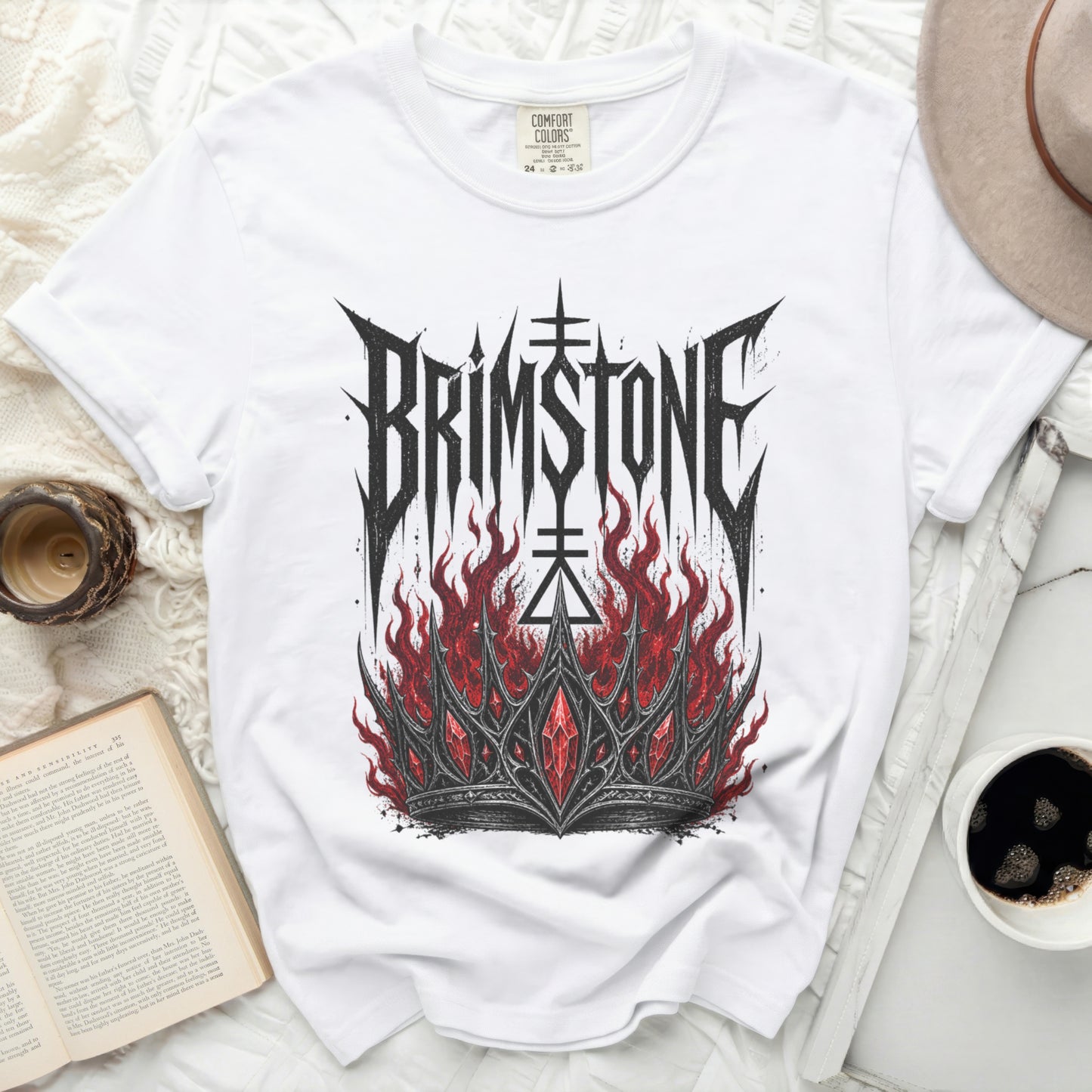 White t-shirt with "BRIMSTONE" in gothic font over a jeweled crown.