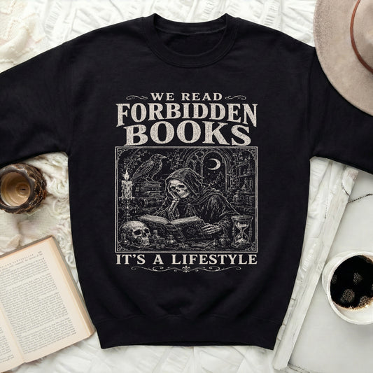 Black sweatshirt with "We Read Forbidden Books It's A Lifestyle" graphic.