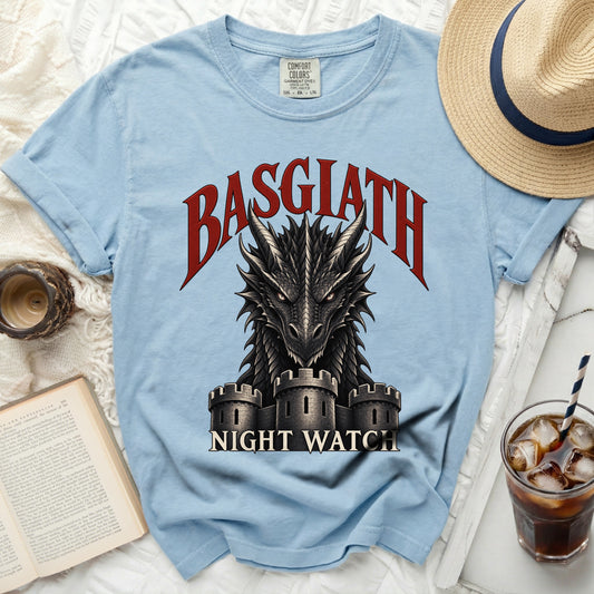 Light blue t-shirt with a black dragon and castle design, featuring text "BASGIATH NIGHT WATCH".