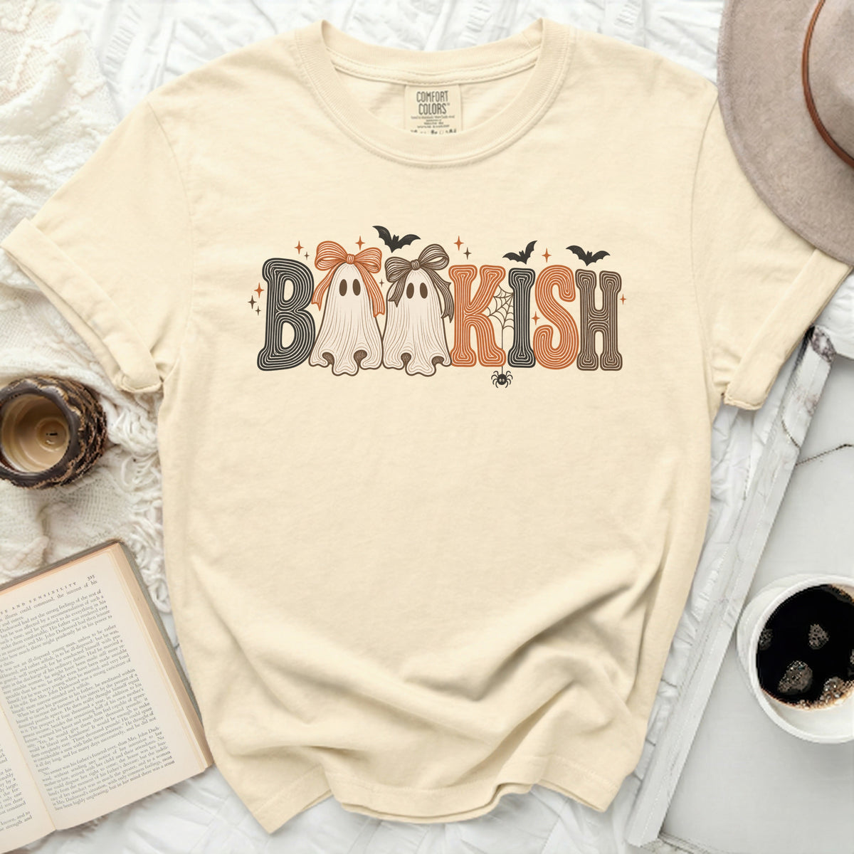 Cream t-shirt with "BOOKISH" graphic featuring ghosts and bats