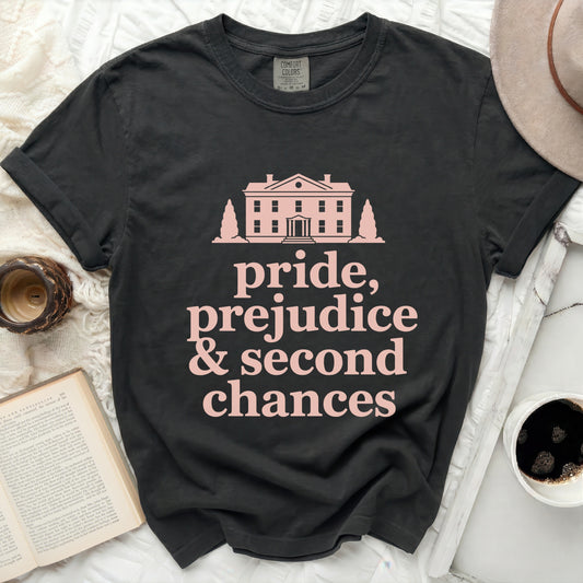 Black Comfort Colors t-shirt with pink text and a house graphic.