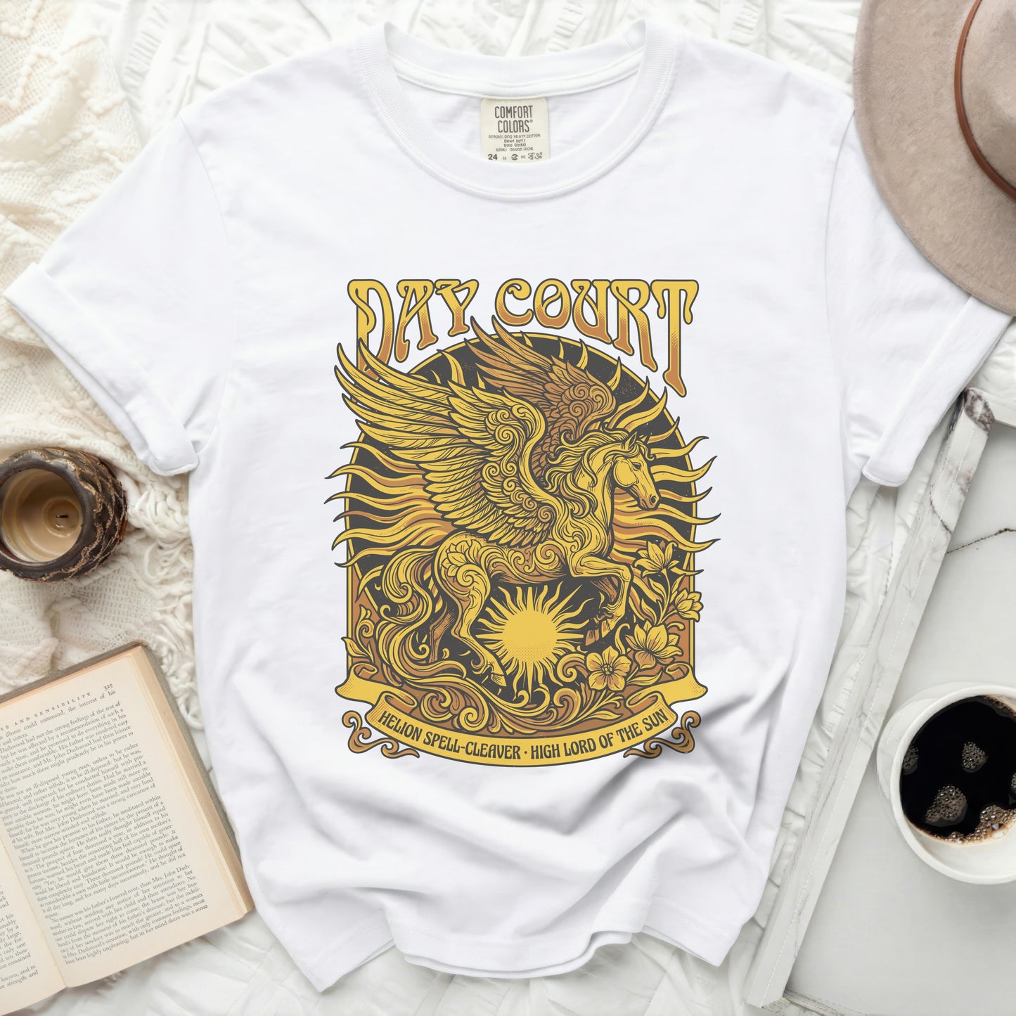 White t-shirt with Pegasus and sun graphic, "Day Court" text.