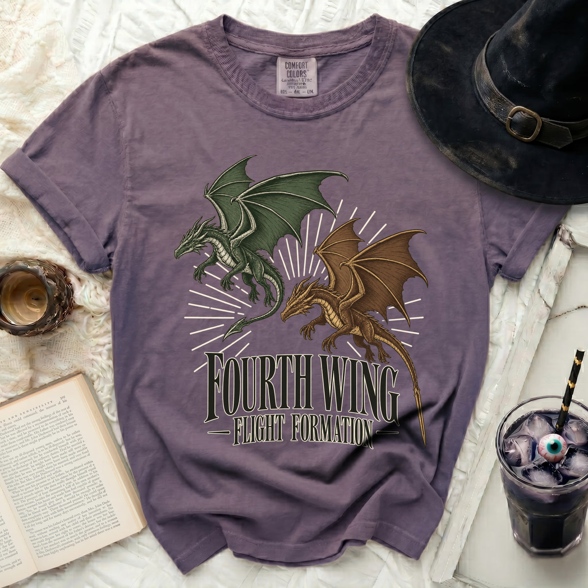 A purple crewneck t-shirt featuring two flying dragons and the text Fourth Wing Flight Formation.