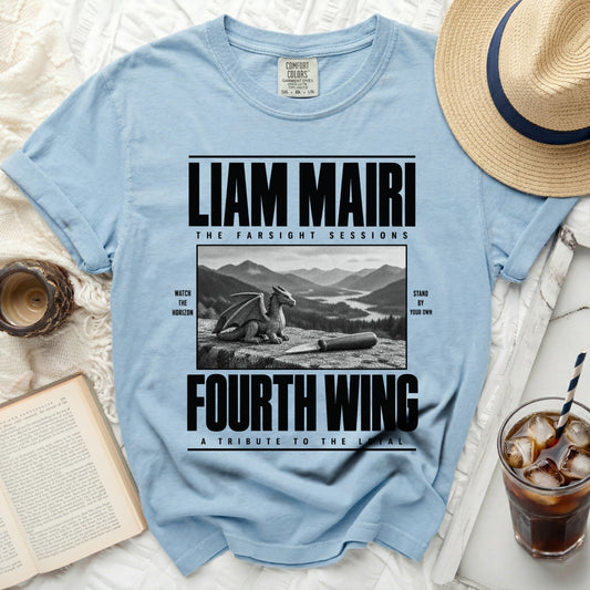 Light blue t-shirt with Liam Mairi Fourth Wing design featuring a dragon and mountains.