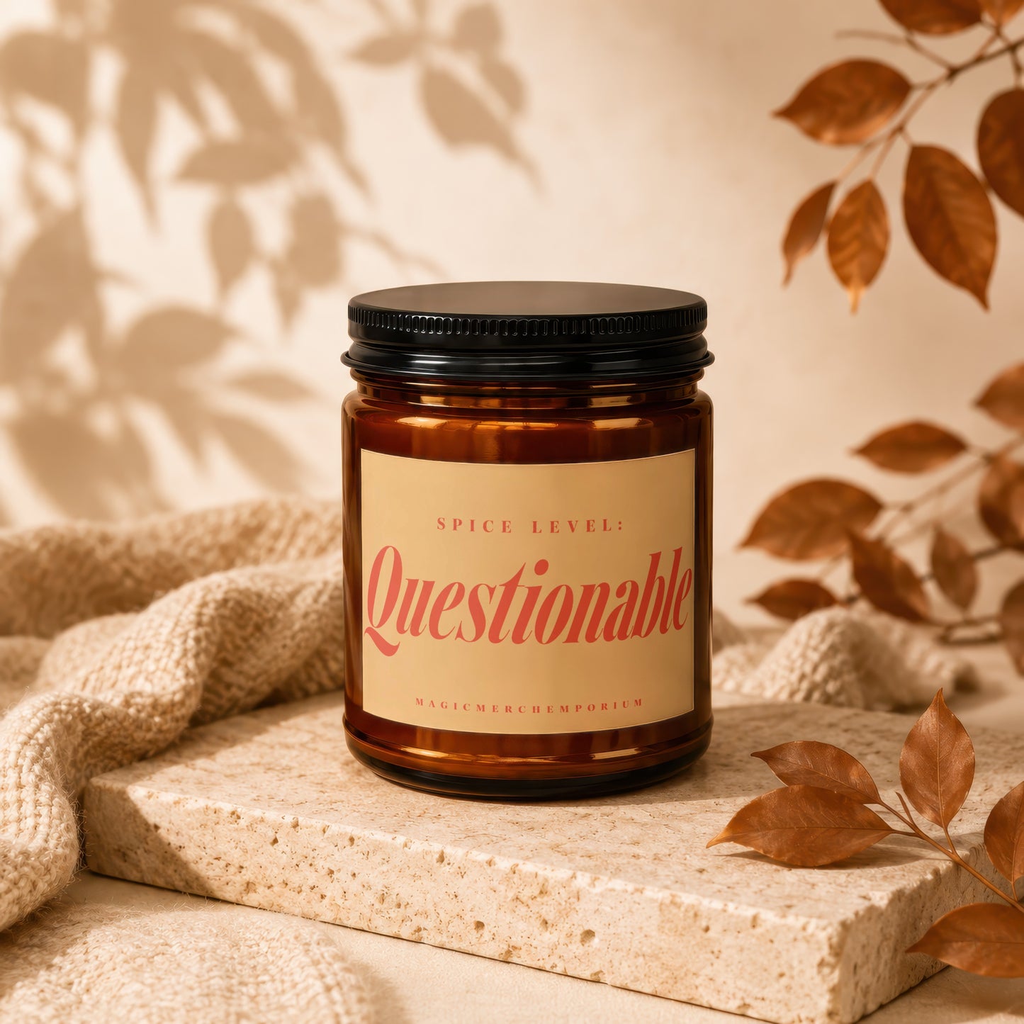 Brown glass candle with black lid labeled "Spice Level: Questionable."