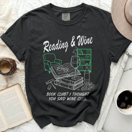 Black t-shirt with "Reading & Wine Book Club? I Thought You Said Wine Club." graphic.
