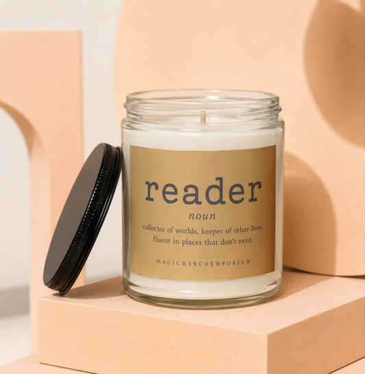 Candle labeled "reader" with definitions, on a pedestal.
