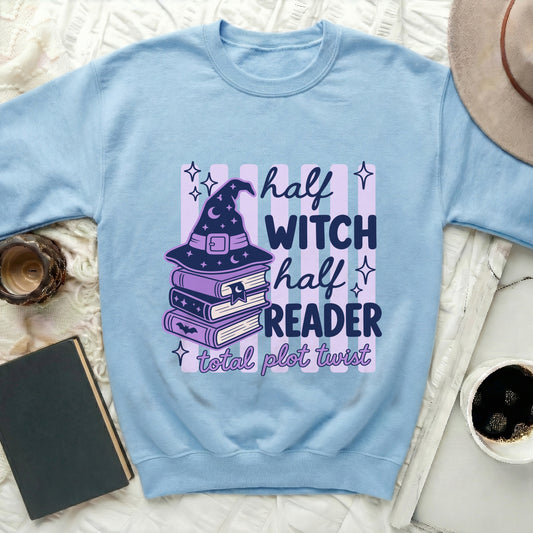 Light blue sweatshirt with "half witch half reader total plot twist" graphic.