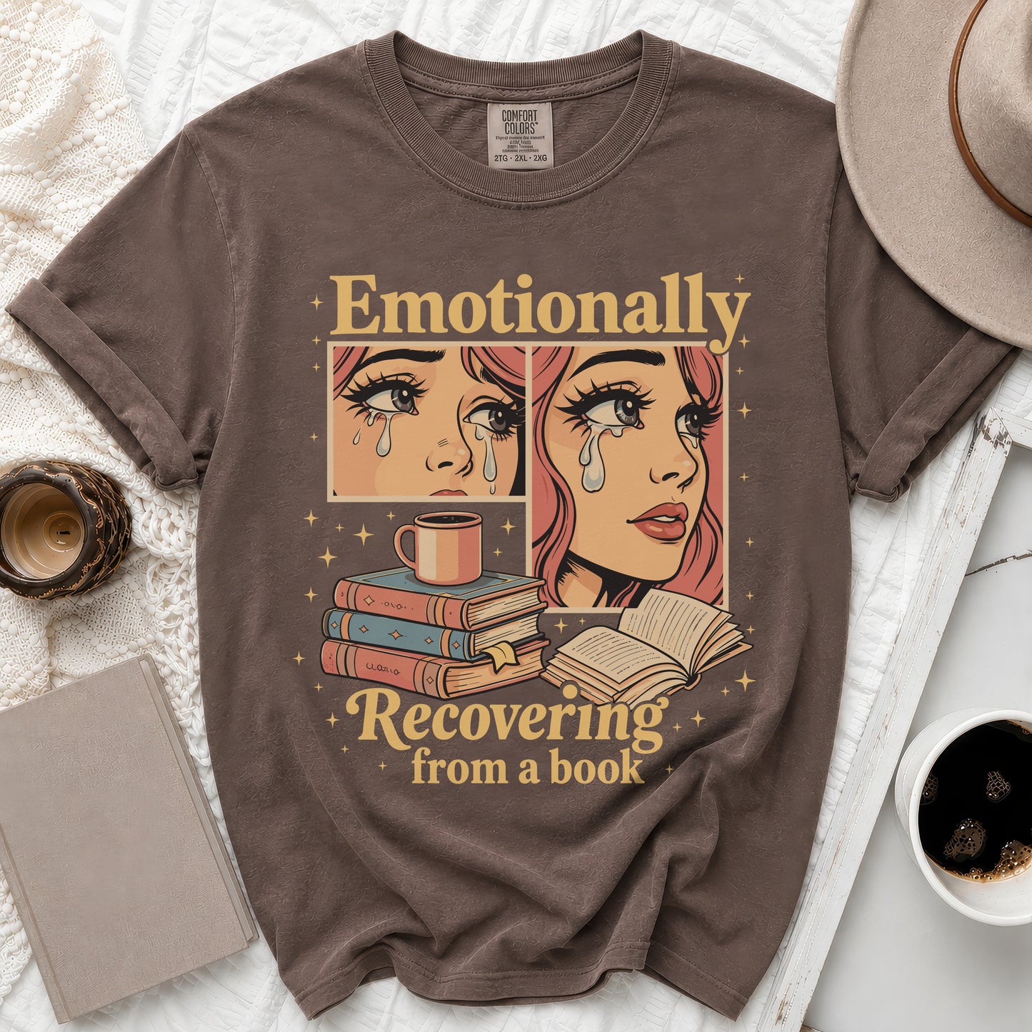 Brown t-shirt with "Emotionally Recovering from a book" graphic.