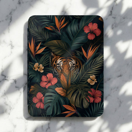 Journal with tiger face and tropical flowers and leaves in a dark jungle setting.
