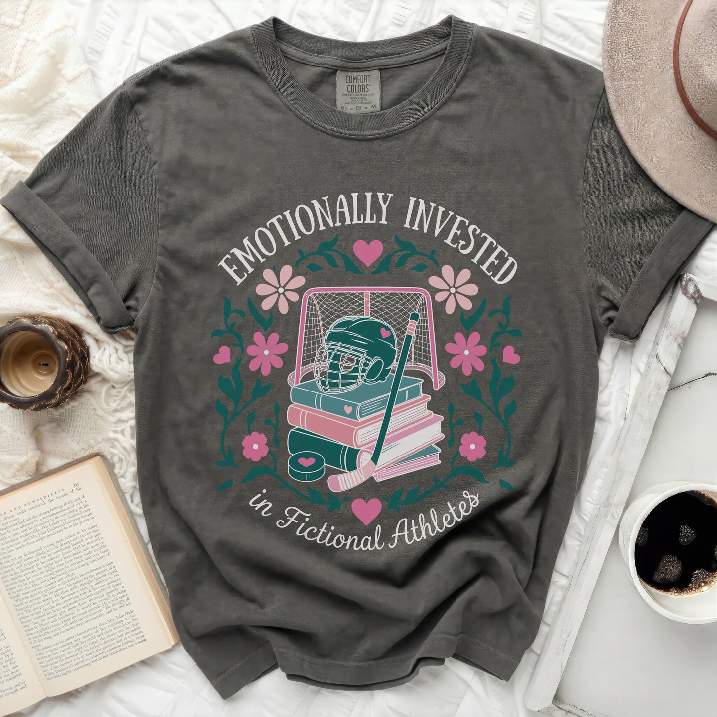 Gray t-shirt with "Emotionally Invested in Fictional Athletes" and hockey motif.