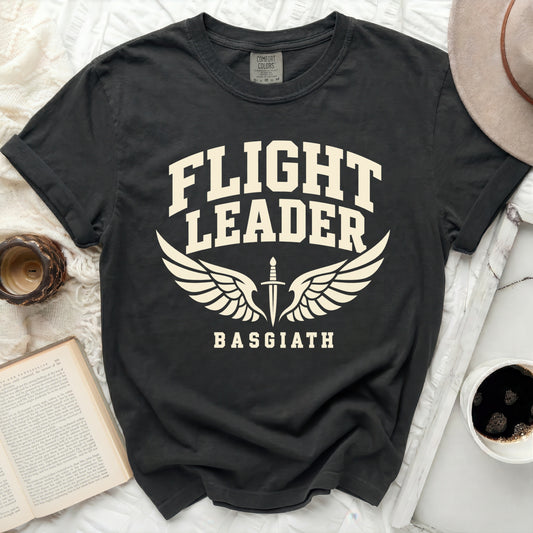 Black t-shirt with cream text "FLIGHT LEADER BASGIATH" and wings with a sword.
