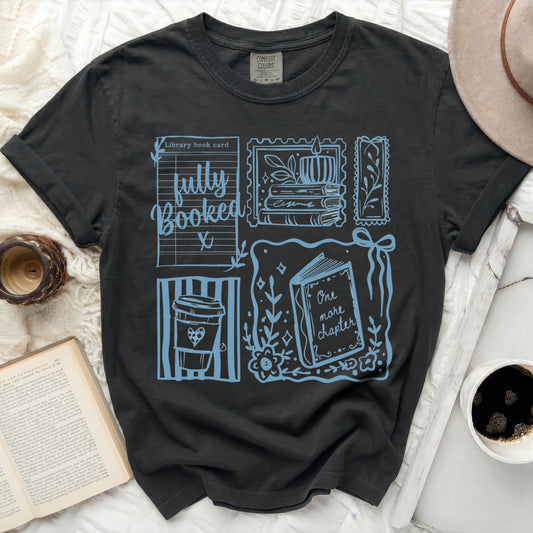 Black t-shirt with blue library book card and coffee cup graphic.