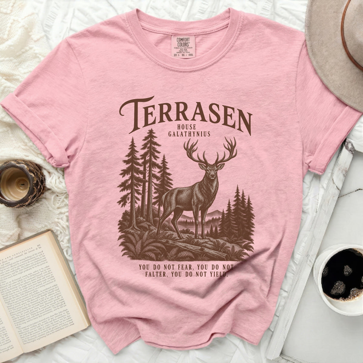Pink t-shirt with Terrasen House Galathynius deer and forest graphic and quote.