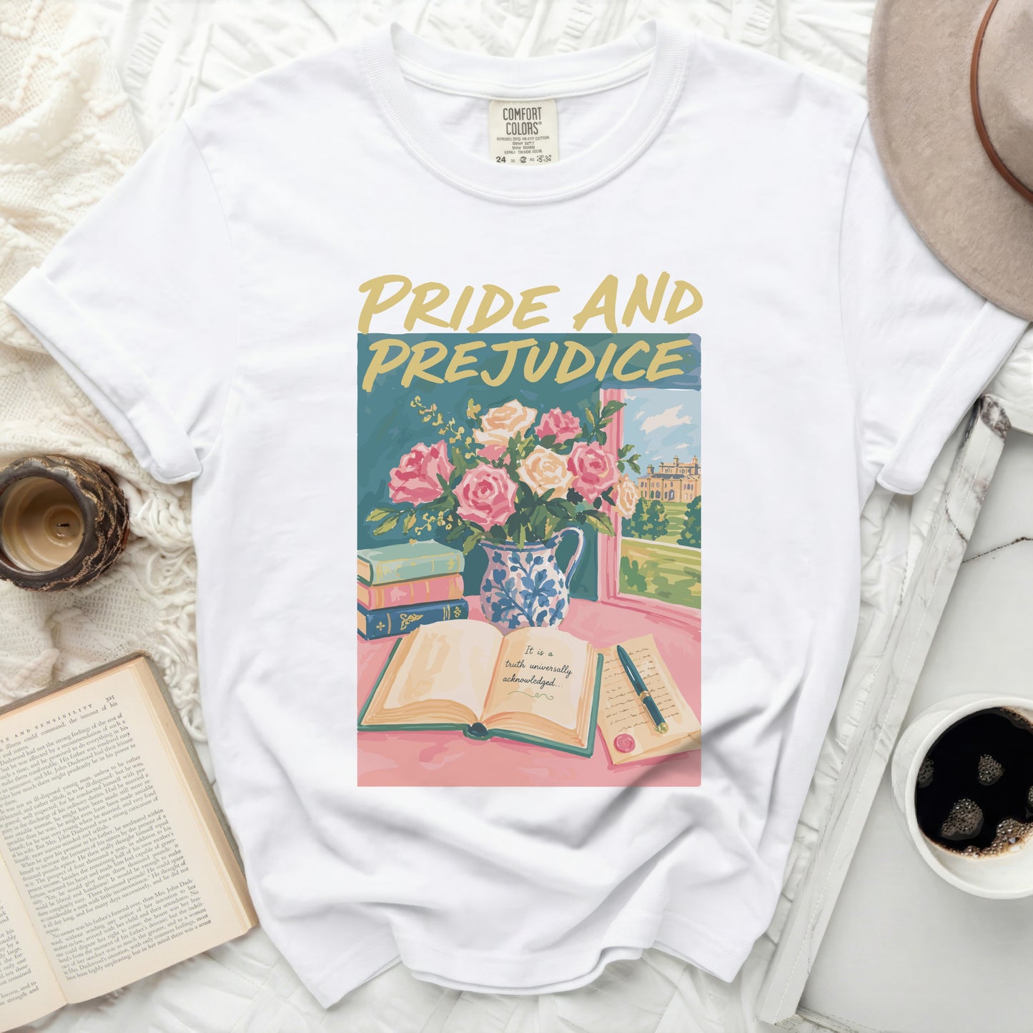 White t-shirt with "Pride and Prejudice" text and floral illustration.