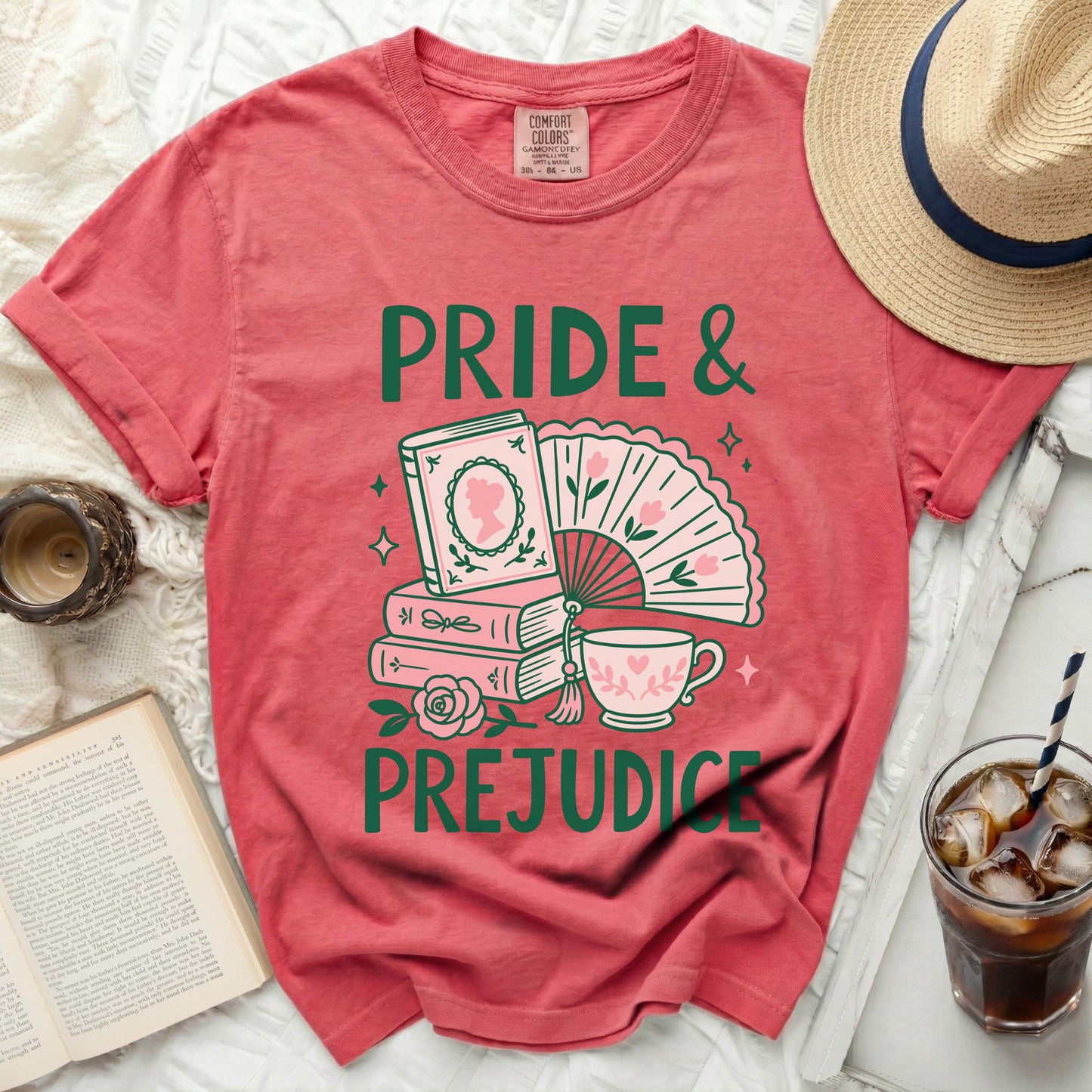 Coral t-shirt with "Pride & Prejudice" text and book illustration.