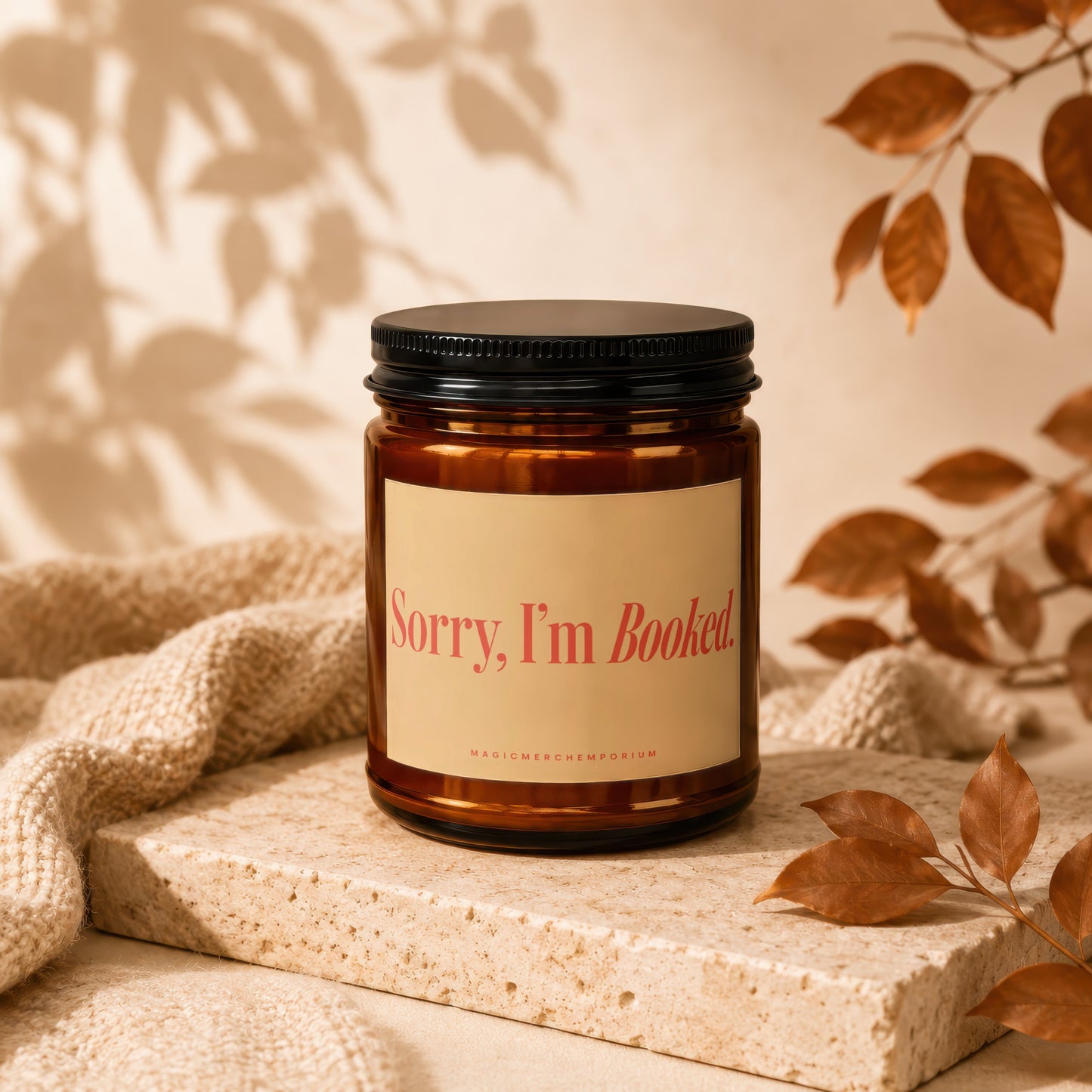 Amber jar candle with "Sorry, I'm Booked." text and "MAGICMERCHEMPORIUM" logo.