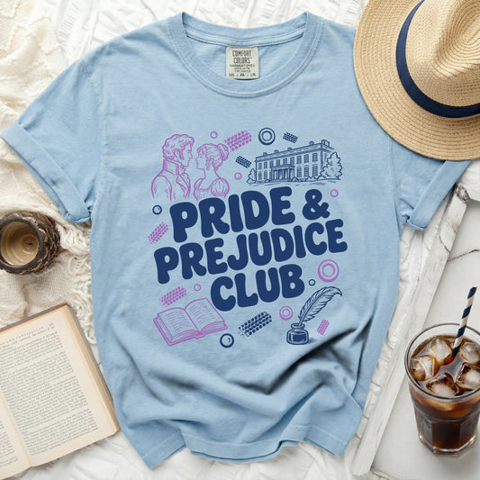 Light blue t-shirt with "Pride & Prejudice Club" text, book, quill, and house illustration.