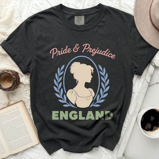 Black t-shirt with "Pride & Prejudice England" and woman silhouette.