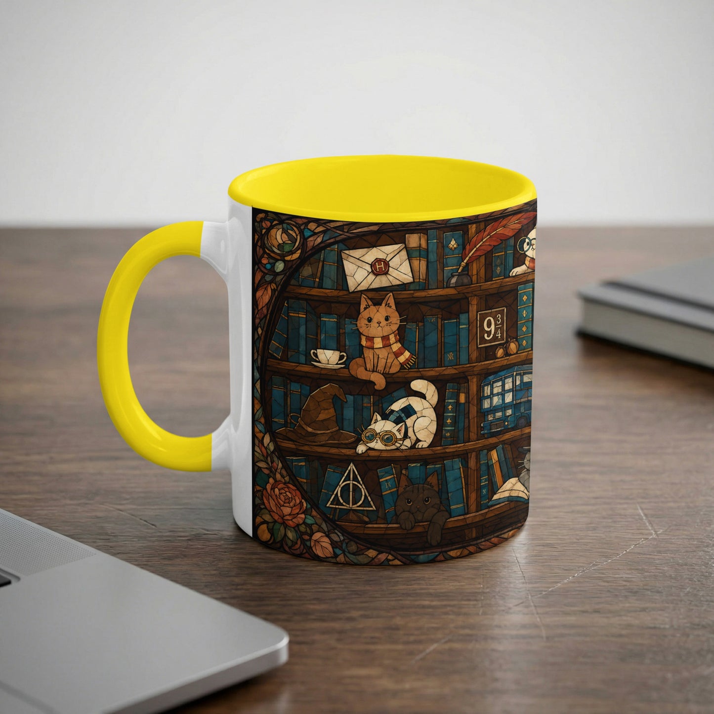 Yellow and white mug with a stained-glass pattern featuring cats on bookshelves.