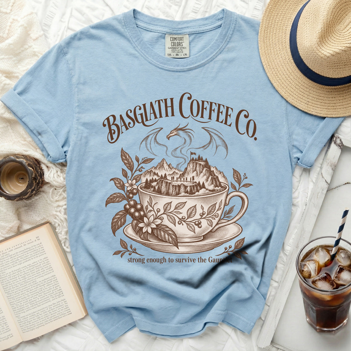 Light blue t-shirt with "Basgiath Coffee Co." and a dragon design.