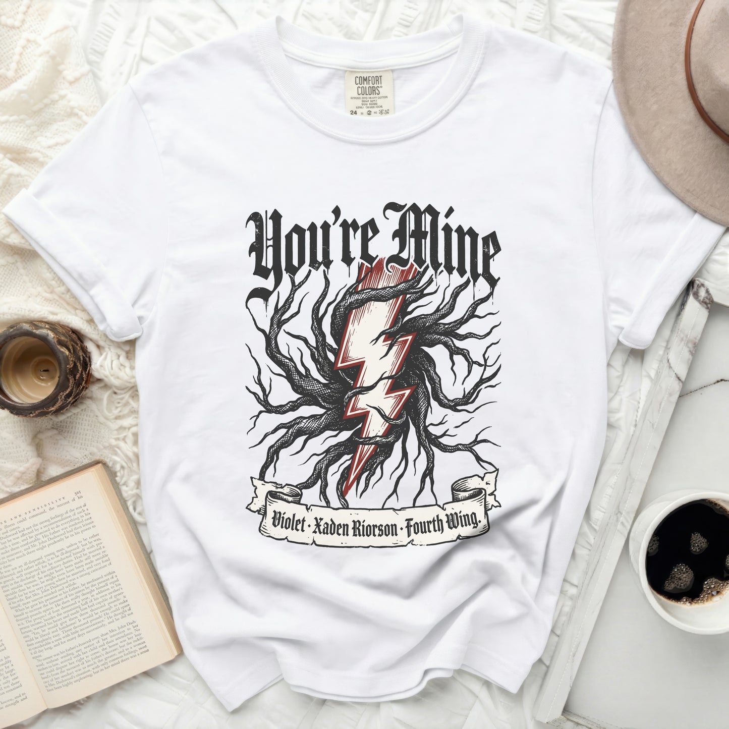 White t-shirt with "You're Mine" and lightning tree graphic.