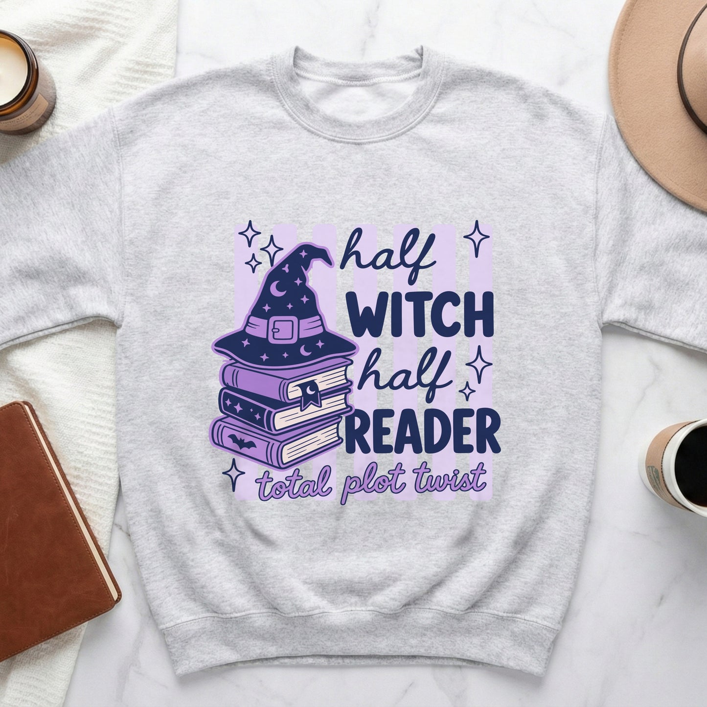 Light gray sweatshirt with "half witch half reader total plot twist" text and stacked books.