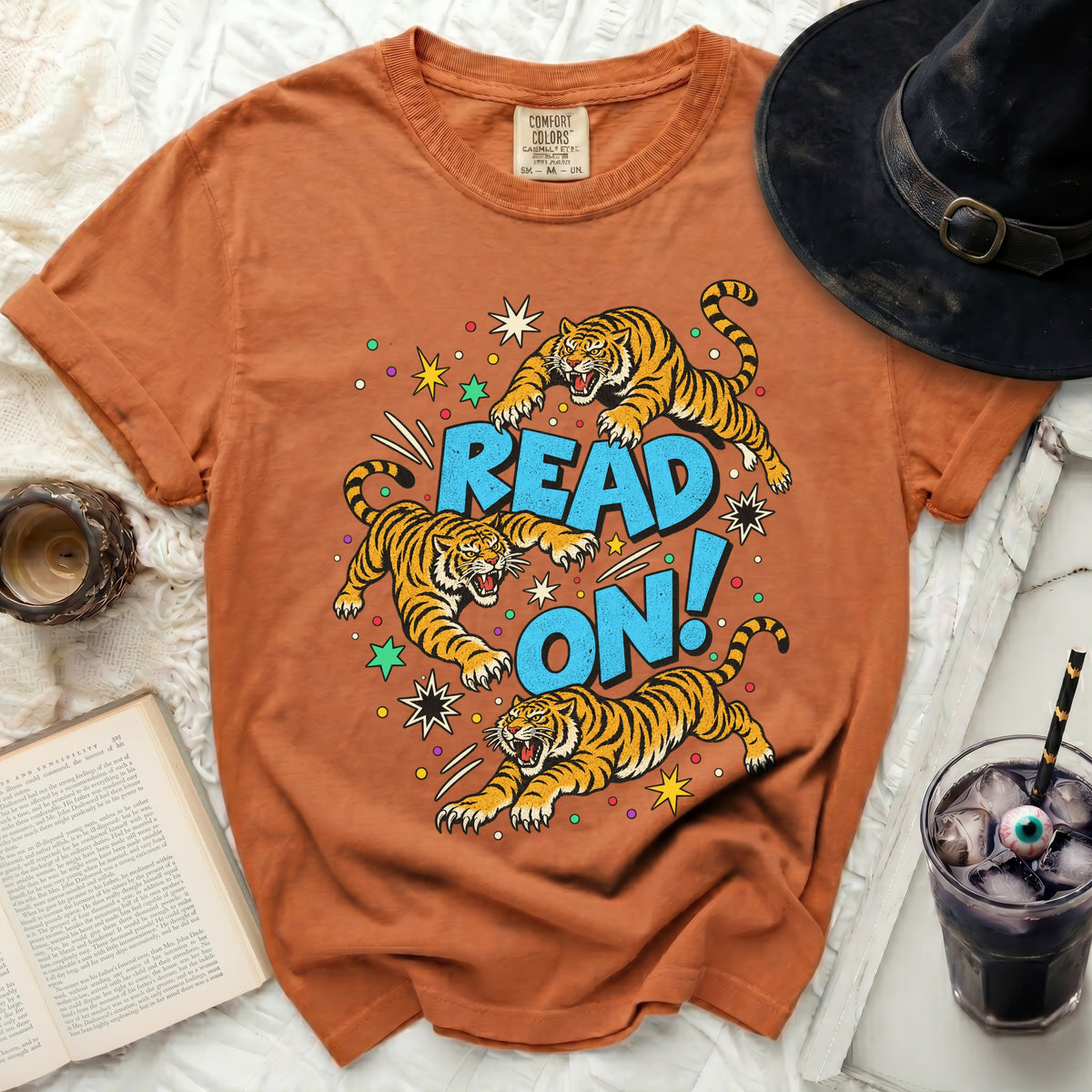 Orange t-shirt with three tigers and "READ ON!" text graphic.
