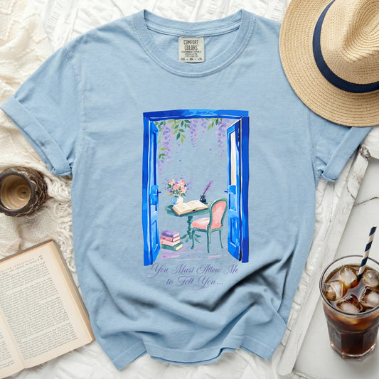 Light blue Comfort Colors t-shirt with blue doorway watercolor design.