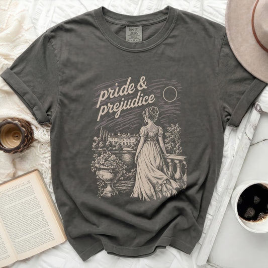 Dark gray t-shirt with "Pride & Prejudice" graphic of a woman and estate.