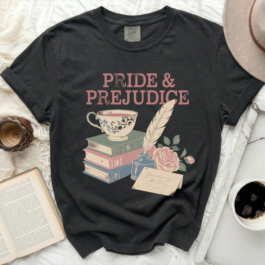 Black t-shirt with Pride & Prejudice text, teacup, books, quill, and rose.