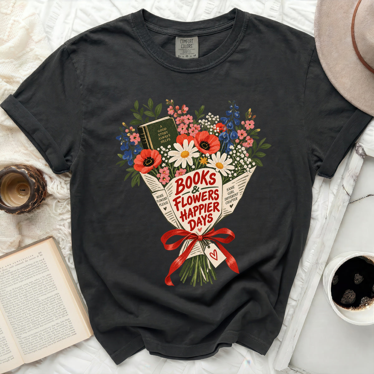 Dark grey t-shirt with a bouquet of books and flowers graphic reading "Books & Flowers Happier Days".
