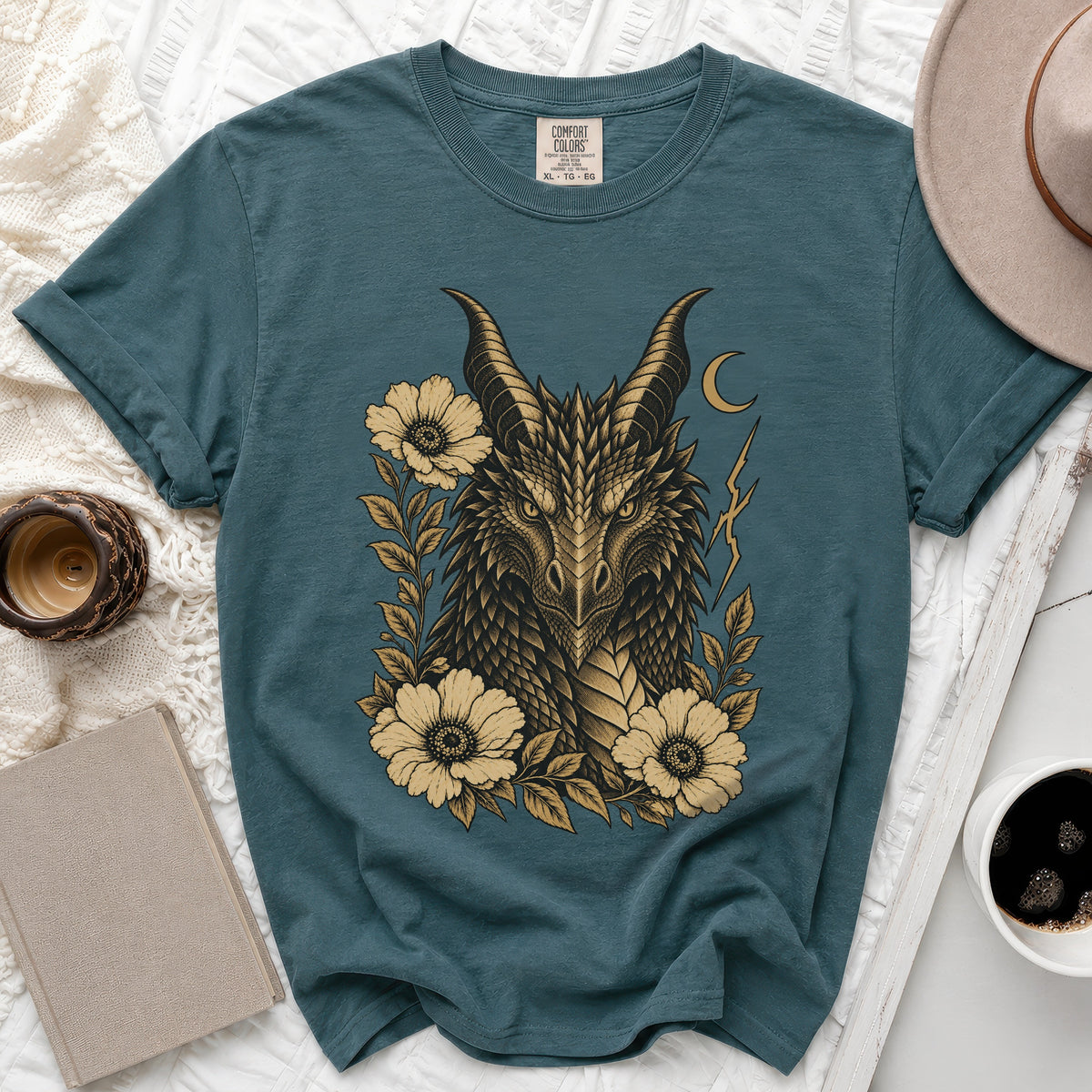Teal t-shirt with a dragon and flower graphic, size XL.