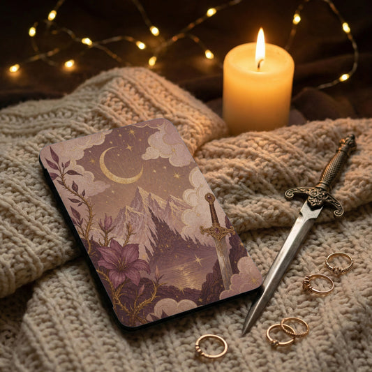 Book cover with celestial mountain and sword illustration, with candle and rings.