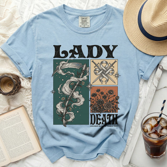 Light blue t-shirt with "LADY DEATH" graphic featuring grim reaper and floral designs.