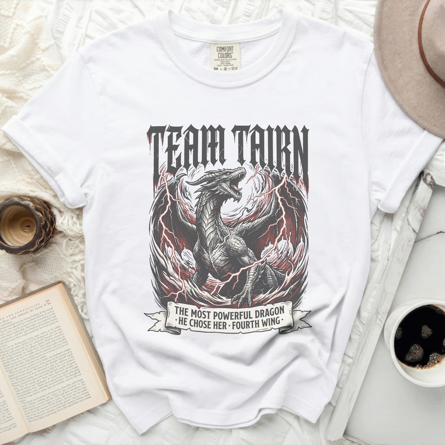 White t-shirt with a dragon graphic and "Team Tairn" text.