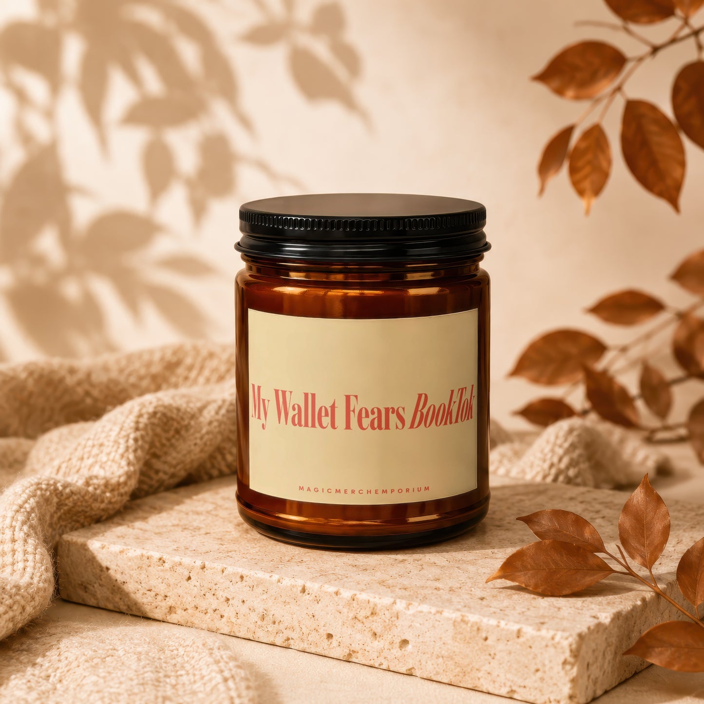 Amber candle with black lid and cream label that says "My Wallet Fears BookTok".