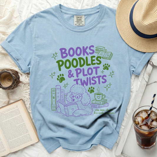 Light blue t-shirt with "Books Poodles & Plot Twists" graphic.