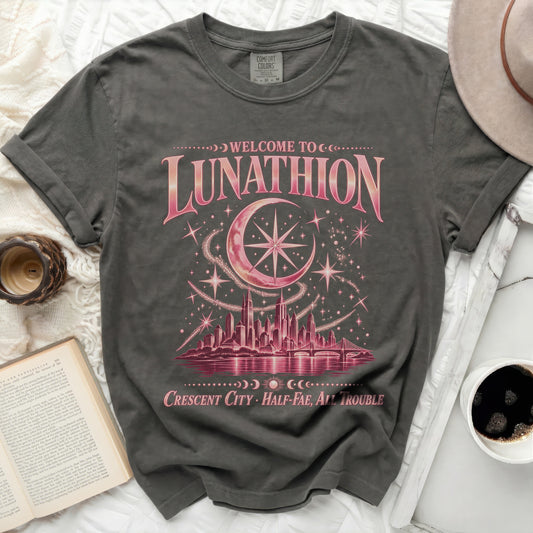Gray t-shirt with "Welcome to Lunathion Crescent City Half-Fae, All Trouble" graphic.