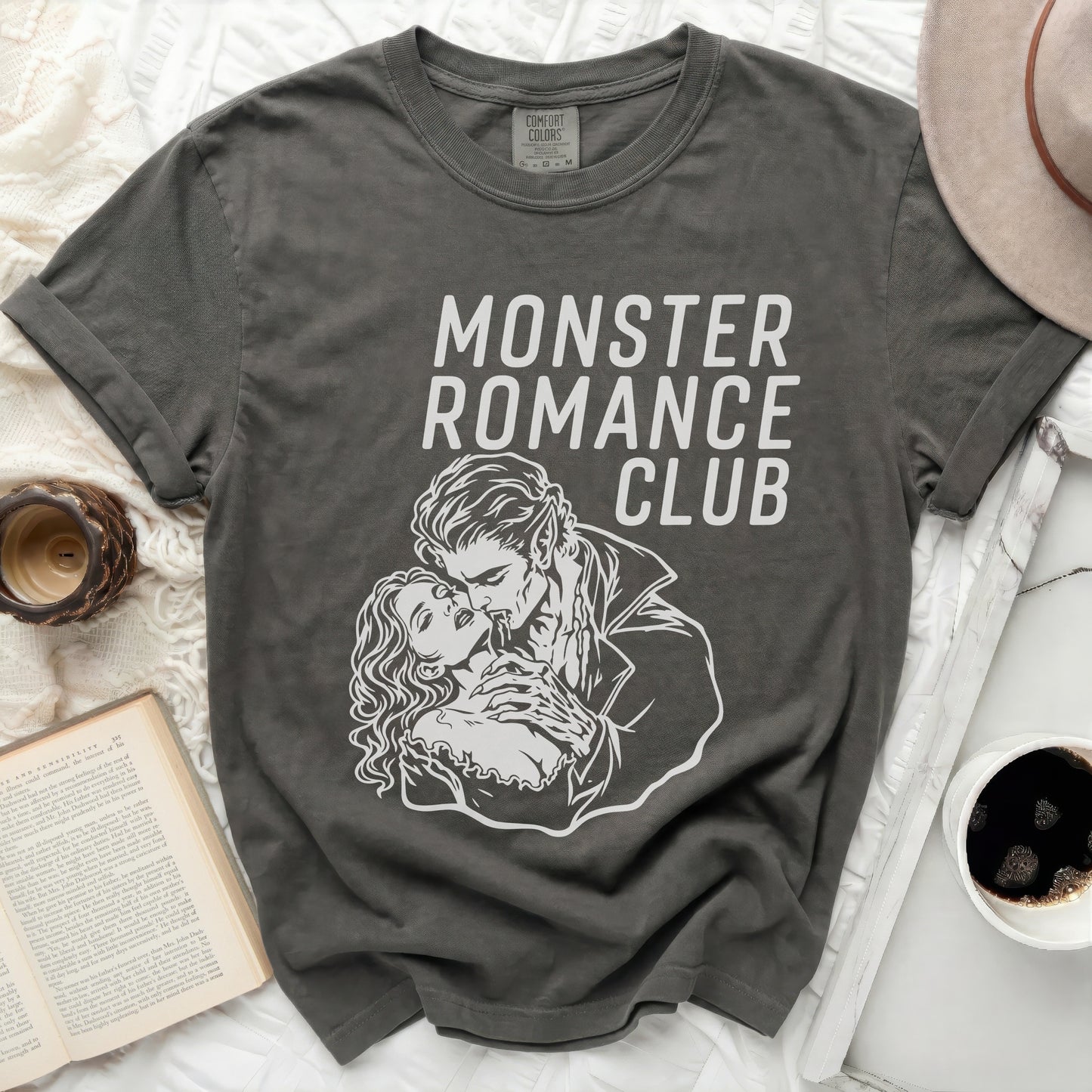 Dark grey t-shirt with "Monster Romance Club" and vampire couple graphic.