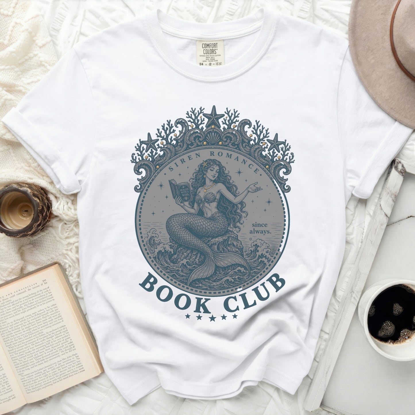 White t-shirt with "Book Club" text and siren illustration.
