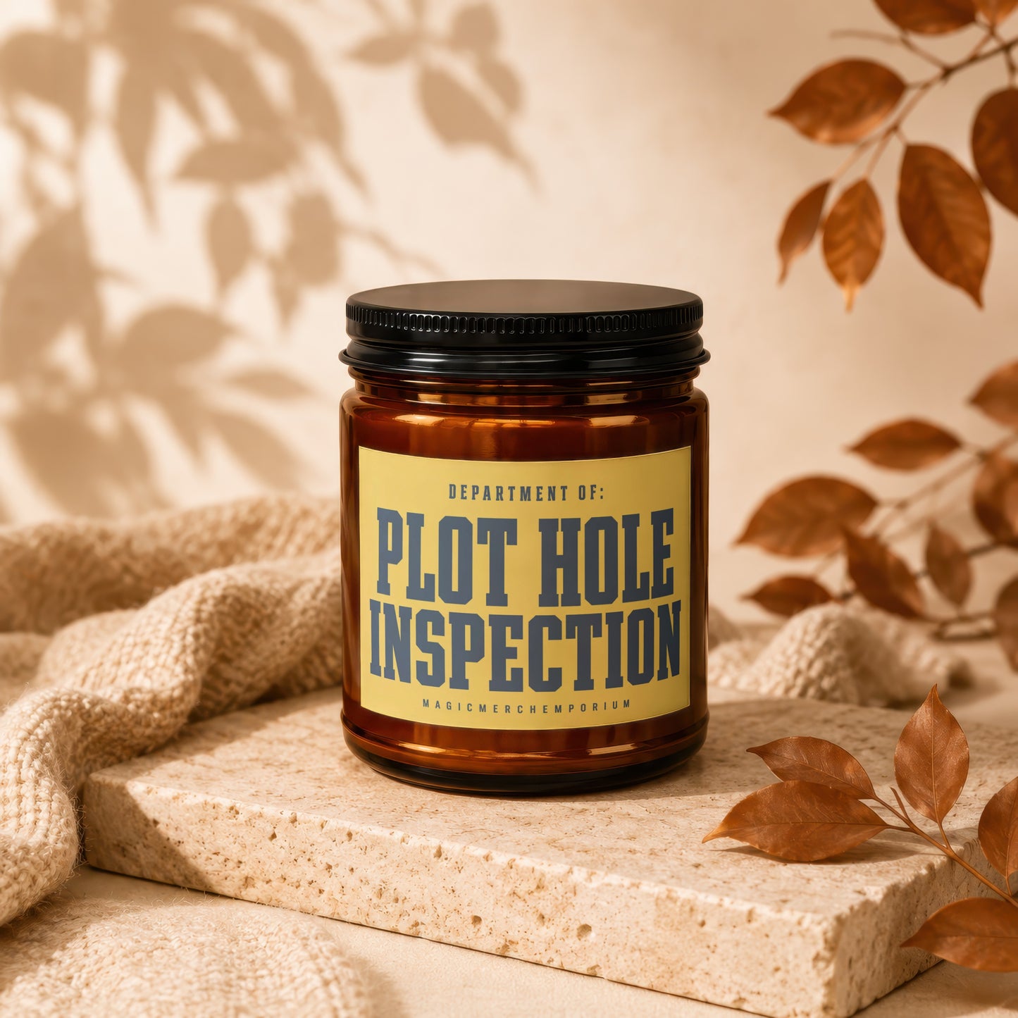 Amber candle labeled "Plot Hole Inspection" and "MagicMerchEmporium" on textured pedestal.