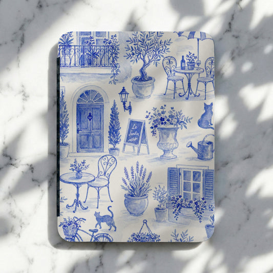 Blue toile notebook with French garden scene, café tables, and cats.