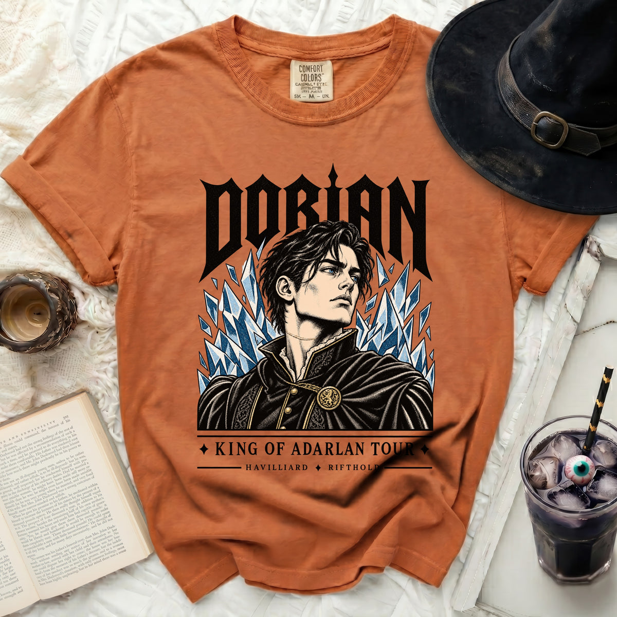 Orange t-shirt with Dorian King of Adarlan Tour graphic featuring a man and ice shards.