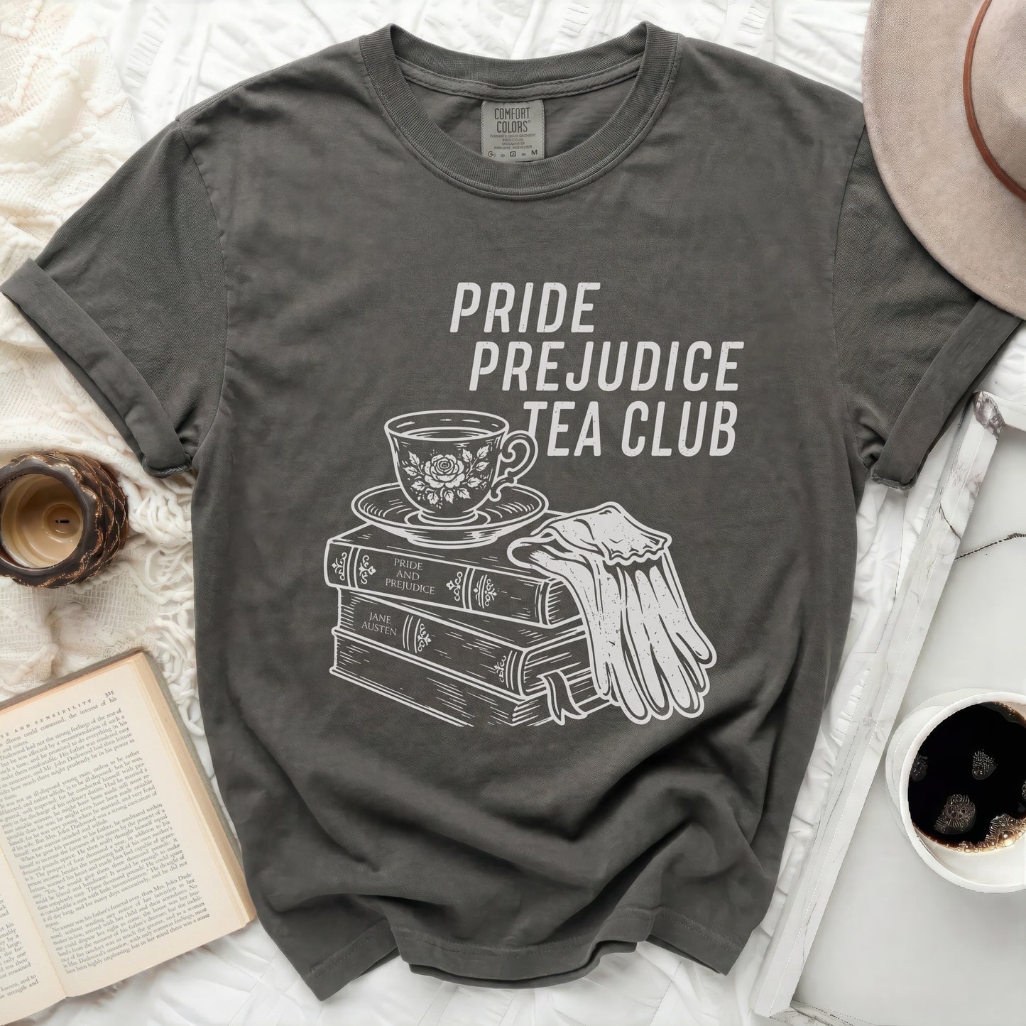 Pride and Prejudice Tea Club graphic on a charcoal t-shirt.