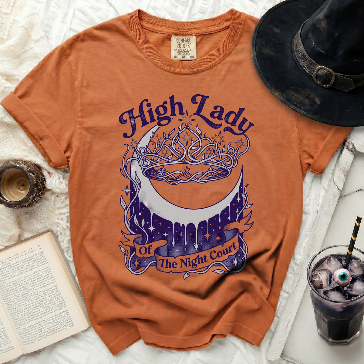 Orange t-shirt with "High Lady of The Night Court" graphic.