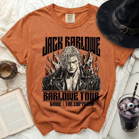 Orange t-shirt with Jack Barlowe tour graphic and a black witch hat.