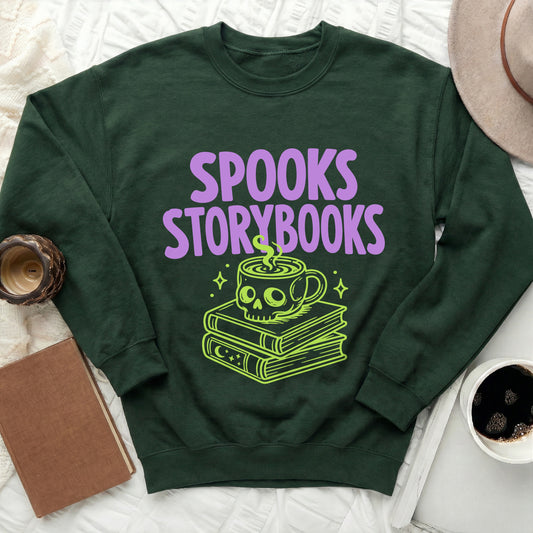 Dark green sweatshirt with "Spooks Storybooks" text and a skull coffee mug on books.